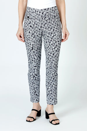 Lisette L Montreal Stretch Dot Ankle Pant in Black/White.  Sketched oblong dots print.  3" waistband pull on pant with tummy control.  Snug through stomach and hip and thigh.  Slim leg.  28" inseam._59950052409710