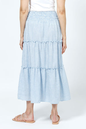 Organic Rags Washable Linen Smocked Waist Tiered Skirt in Denim and white stripes. 3" smocked waistband skirt with 3 flowing tiers. Each tiers seam is ruffled. A line shape. 36" length._35181449838792