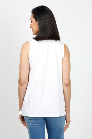 Top Ligne Sleeveless Grommet Keyhole Top in White. Crew neck sleeveless a line tank. Grommet and lace detail at neckline creates keyhole. Relaxed fit._35072189235400