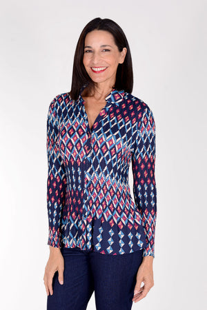 Cali Girls Geo Diamonds Pleat Blouse in Navy with wine, white and blue stylized diamond print.  Pointed collar button down with v neck.  Tiny vertical pleats through body and sleeves.  Long sleeves.  Relaxed fit._34386831704264