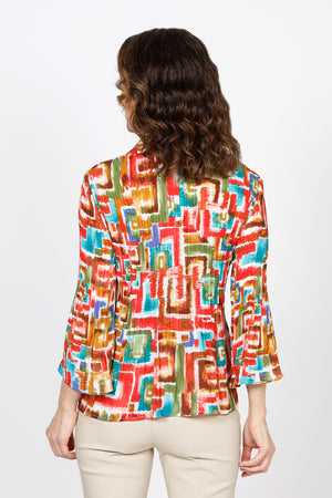 Cali Girls Geometric Pleated Bell Sleeve Blouse. Bright geometric print. Pointed collar v neck button down blouse. Long sleeves. Vertical pleats through body and sleeve. Relaxed fit._35537539104968