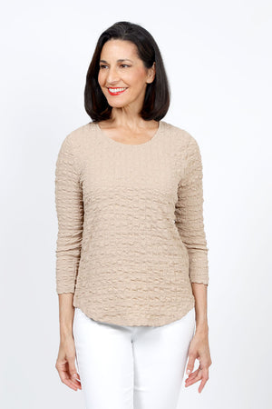 Top Ligne Pucker Scoop Neck Top in Sand. Scoop neck top with 3/4 sleeves. Puckered fabric. Curved hem. Relaxed fit._35322626769096