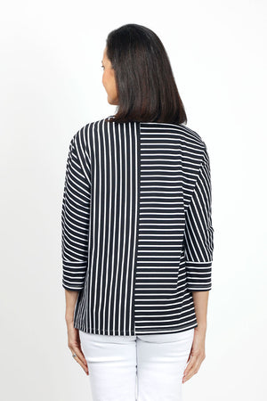 Top Ligne Striped Dolman Sleeve Top in Black/White. Crew neck with banded neckline. 3/4 dolman sleeve with cuff. Horizontal stripes on 1 side of front and back; vertical on the other. Center seams. Relaxed fit._35020812419272