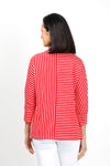 Top Ligne Striped Dolman Sleeve Top in Red/White. Crew neck with banded neckline. 3/4 dolman sleeve with cuff. Horizontal stripes on 1 side of front and back; vertical on the other. Center seams. Relaxed fit._t_35020812353736
