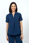 Top Ligne Collared Popover in Navy. Lightweight finely textured top. Pointed collar with open v placket. Short sleeves with sewn cuffs. Loose pleat in front. Curved hem. Relaxed fit._t_35201961427144