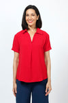 Top Ligne Collared Popover in Red. Lightweight finely textured top. Pointed collar with open v placket. Short sleeves with sewn cuffs. Loose pleat in front. Curved hem. Relaxed fit._t_35201961590984