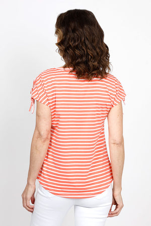 Top Ligne Ruched Shoulder Tee in Coral with narrow white stripes. Crew neck cap sleeve tee with drawstring at the shoulder to adjust length of sleeve. Curved hem. Relaxed fit._35432085258440