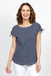 Top Ligne Ruched Shoulder Tee in Navy with narrow white stripes. Crew neck cap sleeve tee with drawstring at the shoulder to adjust length of sleeve. Curved hem. Relaxed fit._t_35432085225672
