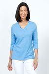 Top Ligne Ruffle Trim Tee in Capri blue. Slub cotton v neck 3/4 sleeve tee with ruffle trim at neckline. Relaxed fit._t_35202202239176