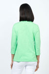 Top Ligne Ruffle Trim Tee in Green. Slub cotton v neck 3/4 sleeve tee with ruffle trim at neckline. Relaxed fit._t_35202203549896