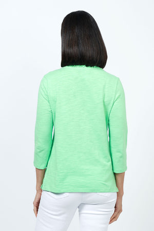 Top Ligne Ruffle Trim Tee in Green. Slub cotton v neck 3/4 sleeve tee with ruffle trim at neckline. Relaxed fit._35202203549896
