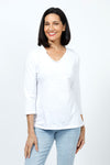 Top Ligne Ruffle Trim Tee in White. Slub cotton v neck 3/4 sleeve tee with ruffle trim at neckline. Relaxed fit._t_35202203451592