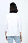 Top Ligne Ruffle Trim Tee in White. Slub cotton v neck 3/4 sleeve tee with ruffle trim at neckline. Relaxed fit._t_35202202370248