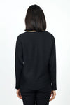 Ten Oh 8 Metallic V Neck Dolman in Black. V neck long sleeve dolman sleeve knit. Knit side to side to create ribbing. Rib trim at neck hem and cuff. Lurex thread adds metallic glow. Relaxed fit._t_34654382719176