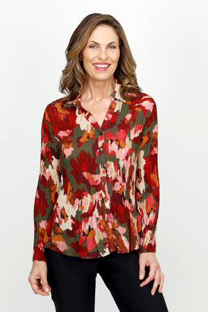 Cali Girls Watercolor Floral Pleat Blouse.  Abstract floral in maroon and beige and green.  Pointed collar button down with notched v neck. Long sleeves. Miniature pleats.  Classic fit._61395051905390