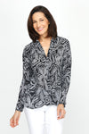 Cali Girls Floral Pleated Blouse in Black/White.  White dotted floral print on black.  Pointed collar notched v button down with long sleeves.  Mini pleats through body and sleeve.  Relaxed fit._t_60245526806894