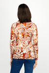 Cali Girls Leaves Pleated Blouse in Russet.  Brown, rust and bone leaf print. Pointed collar notched v button down with long sleeves.  Mini pleats through body and sleeve.  Relaxed fit._t_60245547712878