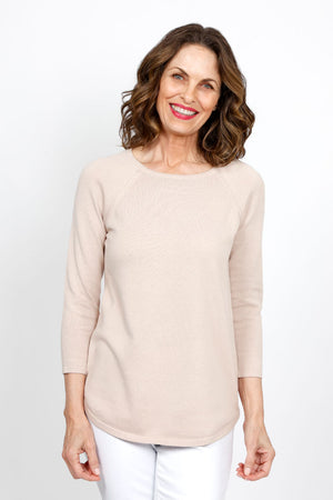 Ten Oh 8 Round Neck Raglan Sweater in Sand. Raglan sleeve round neck knit with 3/4 sleeve. Curved hem. Relaxed fit._35432687829192