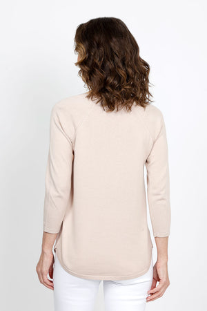 Ten Oh 8 Round Neck Raglan Sweater in Sand. Raglan sleeve round neck knit with 3/4 sleeve. Curved hem. Relaxed fit._35432687861960