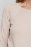 Ten Oh 8 Round Neck Raglan Sweater in Sand. Raglan sleeve round neck knit with 3/4 sleeve. Curved hem. Relaxed fit._t_35432687993032