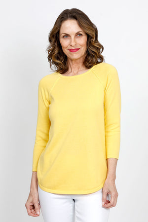 Ten Oh 8 Round Neck Raglan Sweater in Yellow.  Raglan sleeve round neck knit with 3/4 sleeve.  Curved hem.  Relaxed fit._35432687796424