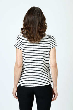 Top Ligne Pucker Stripe Cap Sleeve Surplice Top in Black/White.  Textured stripe v neck with diagonal striped surplice front.  Horizontal stripe back.  Ruch detail at sides.  Cap sleeve.  Relaxed fit._60254389010798