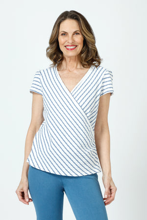Top Ligne Pucker Stripe Cap Sleeve Surplice Top in Denim/White.  Textured stripe v neck with diagonal striped surplice front.  Horizontal stripe back.  Ruch detail at sides.  Cap sleeve.  Relaxed fit._60254388978030