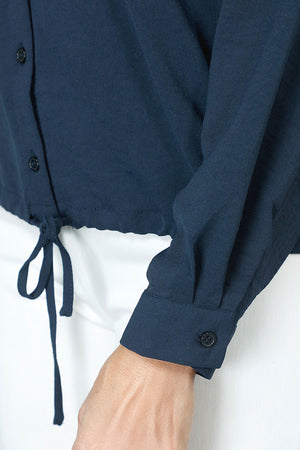 Top Ligne  Pocket Tie Blouse in Indigo.  Pointed collar button down with cinch tie at hem.  Long sleeves with button cuff.  Relaxed fit._60711634665838