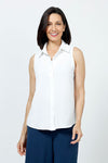 Top Ligne Sleeveless Button Down in White. Lightly textured button down top with pointed collar. Curved hem. Relaxed fit._t_35202181759176