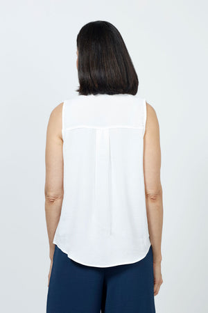 Top Ligne Sleeveless Button Down in White. Lightly textured button down top with pointed collar. Curved hem. Relaxed fit._35202181824712