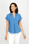 Top Ligne Airflow Collar Top in Blue. Collared polo top with split v neck.  Short sleeve with cuff.  Back yoke with pleat.  Curved hem.  Relaxed fit._t_60216364794222