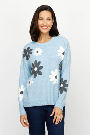 Ten Oh 8 Flower Crew Sweater in Blue.  Gray and white textured petals on front and sleeves on a heathered light blue background. Crew neck long sleeves sweater with rib trim on neck hem and cuff.  Relaxed fit._61226381508974