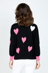 Ten Oh 8 Hearts Crew Sweater in Black.  Intarsia hearts in pink and white.  Contrast cuffs in pink.  Crew neck, long sleeve with dropped shoulders.  Rib trim at neck hem and cuff.  Side slits.  Relaxed fit._t_59519665537390