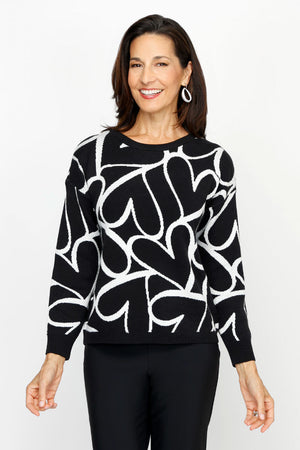 Ten Oh 8 Jacquard Hearts Pullover in Black with white intarsia overlapping hearts.  Crew neck long sleeve sweater.  Solid rib trim at neck, hem and cuff.  Relaxed fit._61226367287662