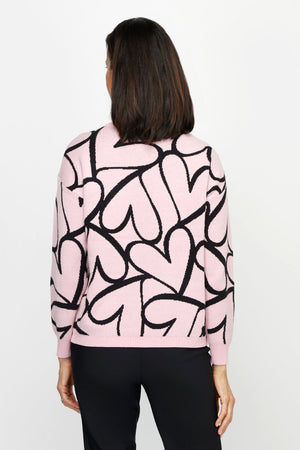 Ten Oh 8 Jacquard Hearts Pullover in Pink with black intarsia overlapping hearts.  Crew neck long sleeve sweater.  Solid rib trim at neck, hem and cuff.  Relaxed fit._61226367385966