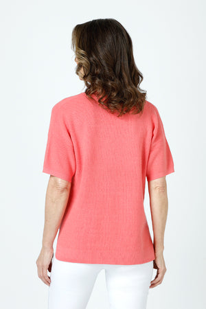 Ten Oh 8 Waffle Short Sleeve V Neck Sweater in Coral.  V neck short sleeve waffle weave sweater with dropped shoulder.  Rib trim at neck hem and cuff.  Side slits.  Relaxed fit._59988217463150