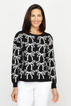 Ten Oh 8 Bows Crew Sweater in Black with grid of white intarsia bows.  Crew neck, long sleeve sweater with solid rib at neck, hem and cuff.  Relaxed fit._t_61228819120494