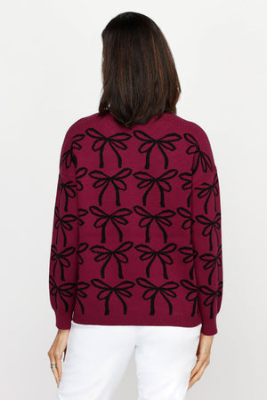Ten Oh 8 Bows Crew Sweater in Wine with grid of black intarsia bows.  Crew neck, long sleeve sweater with solid rib at neck, hem and cuff.  Relaxed fit._61228819218798