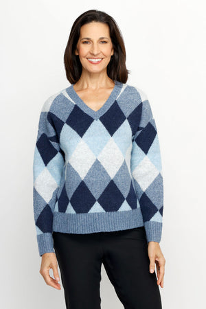 Ten Oh 8 Argyle V Neck Sweater in Blue.  Soft and fuzzy knit in shades of blue white diamonds.  V neck long sleeve sweater with dropped shoulder.  Rib trim at neck hem and cuff.  Relaxed fit._61511935426926