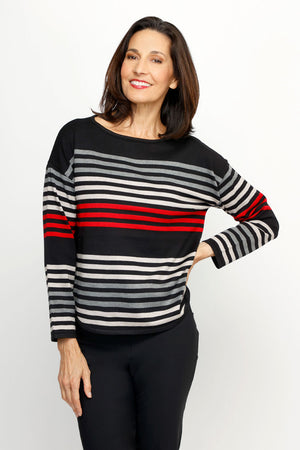 Ten Oh 8 Striped Boatneck Sweater in Black.  Narrow horizontal multi stripes in red, and shades of gray on a black background.  Boatneck knit with long sleeves and dropped shoulder.  Curved hem.  Ribbed trim at hem and cuff.  Relaxed fit._61512195408238