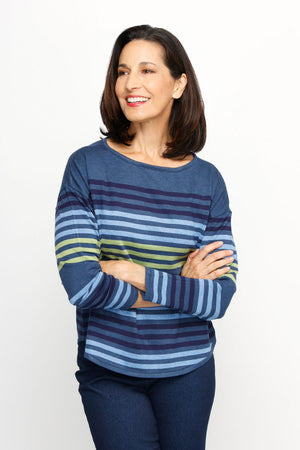 Ten Oh 8 Striped Boatneck Sweater in Denim.  Narrow horizontal multi stripes in navy, light blue and green on a denim blue background.  Boatneck knit with long sleeves and dropped shoulder.  Curved hem.  Ribbed trim at hem and cuff.  Relaxed fit._61512195506542
