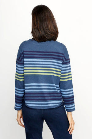 Ten Oh 8 Striped Boatneck Sweater in Denim.  Narrow horizontal multi stripes in navy, light blue and green on a denim blue background.  Boatneck knit with long sleeves and dropped shoulder.  Curved hem.  Ribbed trim at hem and cuff.  Relaxed fit._61512195539310