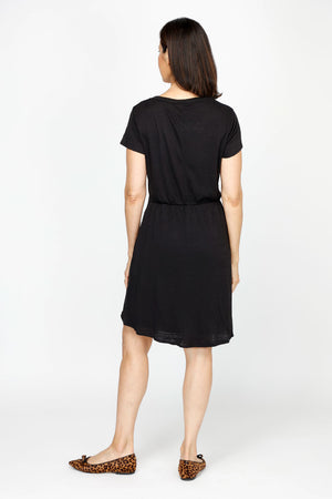 Top Ligne Tie Front Dress in Black.  Crew neck short sleeve dress with front wrap tie panels.  Elastic back waist.  Textured  fabric.  Relaxed fit._60492157157742