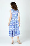 Top Ligne Kaleidoscope Airflow Sleeveless Dress in Blue. Abstract blue multi print on a white background.  Sleeveless v neck dress with faux surplice.  Empire cinchable waist with side ties.  2 tier ruffled skirt.  A line shape. Relaxed fit._t_59938884616558