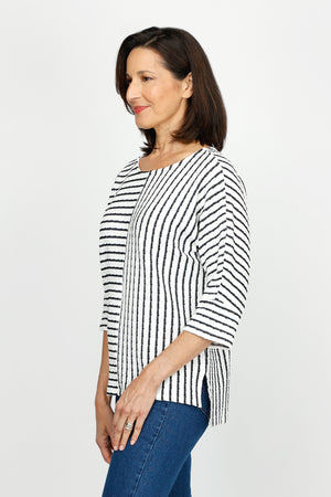 Top Ligne Pucker Mixed Stripe Elbow Sleeve Top in Black/White.  Textural fabric.  Bi directional stripes with center seaming front and back. Crew neck, dolman elbow sleeve with cuff.  High low hem with side slits.  Relaxed fit._60255241601390