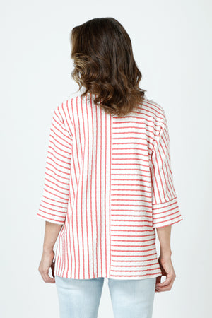 Top Ligne Pucker Mixed Stripe Elbow Sleeve Top in Coral/White.  Textural fabric.  Bi directional stripes with center seaming front and back. Crew neck, dolman elbow sleeve with cuff.  High low hem with side slits.  Relaxed fit._60242942034286