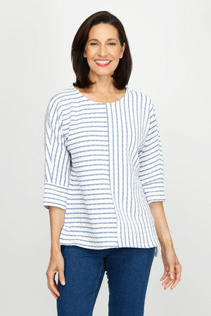 Top Ligne Pucker Mixed Stripe Elbow Sleeve Top in Denim/White.  Textural fabric.  Bi directional stripes with center seaming front and back. Crew neck, dolman elbow sleeve with cuff.  High low hem with side slits.  Relaxed fit._60255241470318