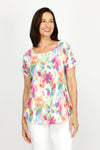 Top Ligne Floral Airflow Round Neck Top in Multi.  Blurred bright multi colored floral print.  Round neck with dolman short sleeve and sewn cuff.  Curved hem.  A line shape.  Relaxed fit._t_60220240724334