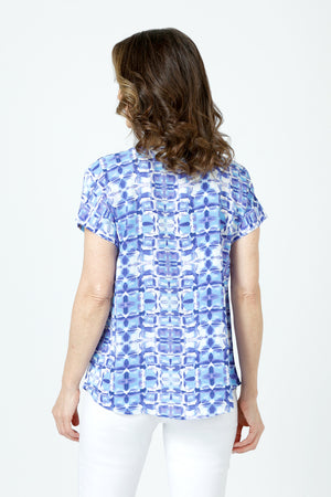 Top Ligne Kaleidoscope Airflow Round Neck Top in Blue.  Miniature geometric print in shades of blue.  Round neck dolman short sleeve top with sewn cuff.  Curved hem.  Relaxed fit._59981013320046
