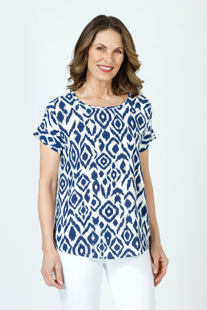 Top Ligne Ikat Airflow Round Neck Top.  Navy ikat print on a white background.  Round neck with dolman short sleeve sewn cuff top.  Curved hem.  Relaxed fit._59980971377006